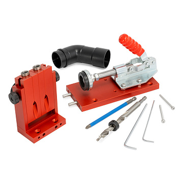 Комплектация - кондуктор сверлильный, ступенчатое сверло с ограничителем, бита крестовая PH2 127 мм, ключ шестигранный 2.5 и 3 мм, патрубок стружкоотведения